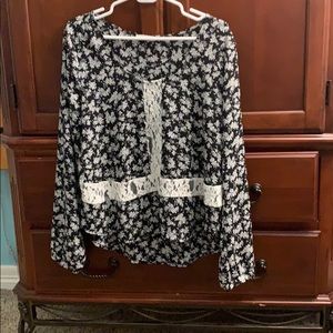 Black and white floral patterned blouse